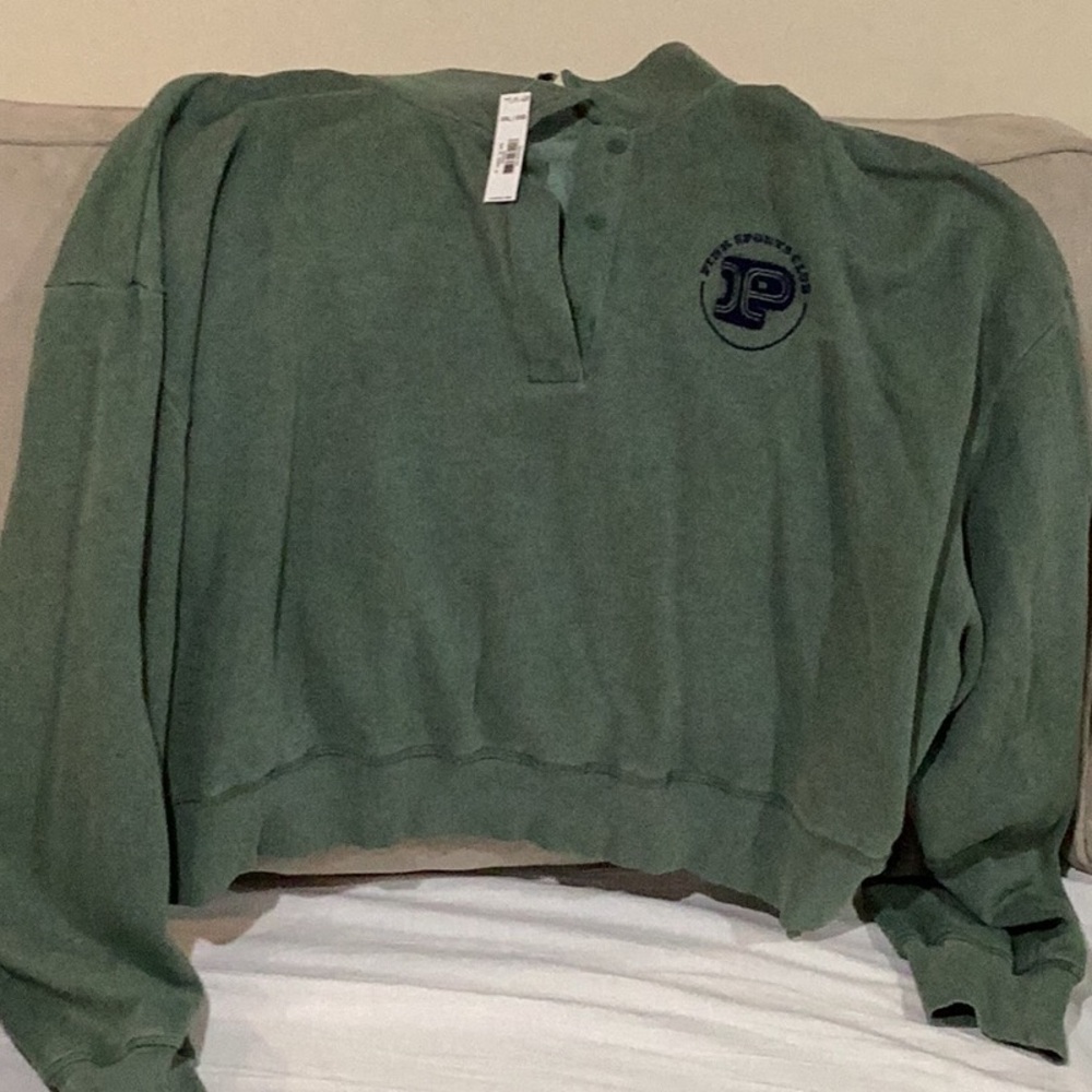 PINK…. Sweatshirt. Color is green the item in brand new with tag, never worn